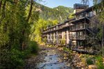 Situated along Roaring Fork River in the East End of Downtown Aspen 